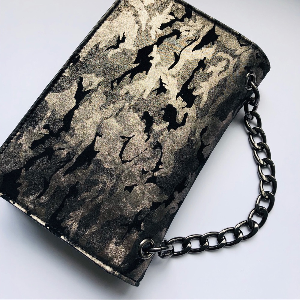 Nine West metallic gold/black camouflage clutch